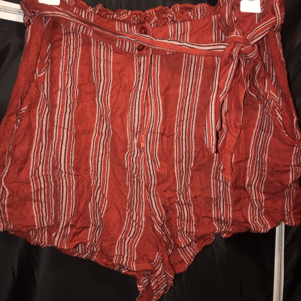 High waisted orange pin strip shorts